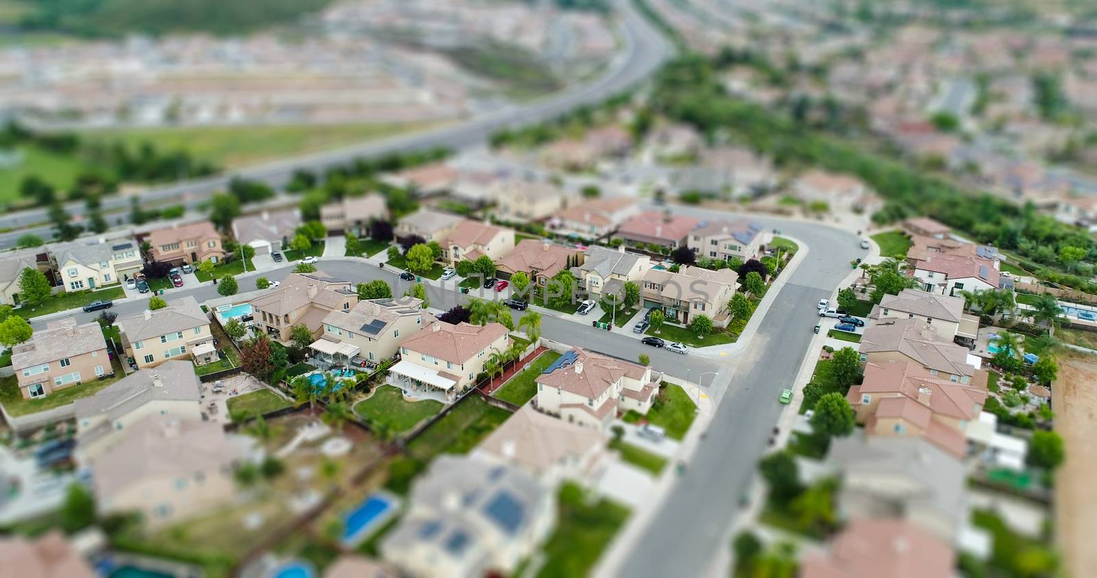 Aerial View of Populated Neigborhood Of Houses With Tilt-Shift Blur.