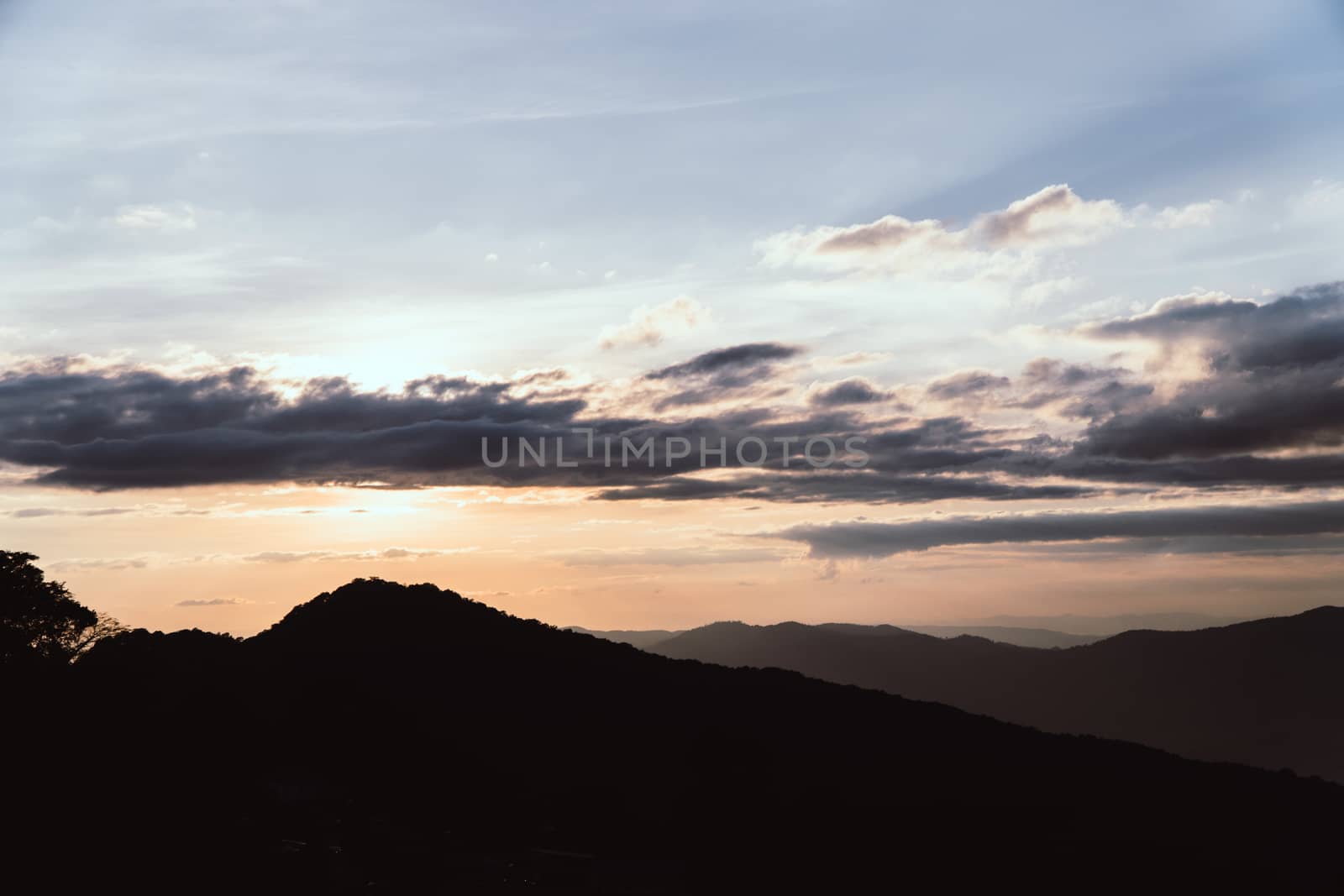 Overlapping mountains and rain clouds