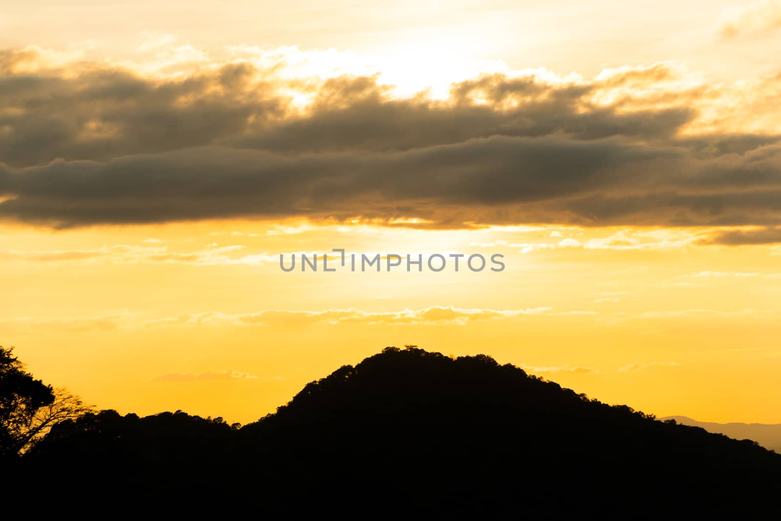 Mountain and sky at sunset by somesense