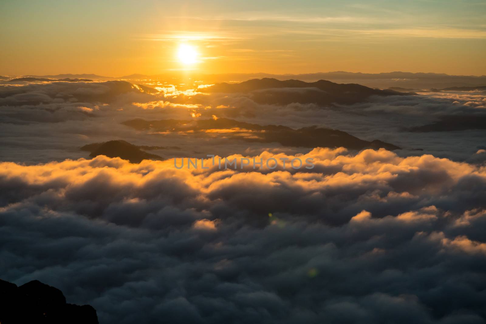 sunrise and sea of fog view on phu chi fa mountain by somesense