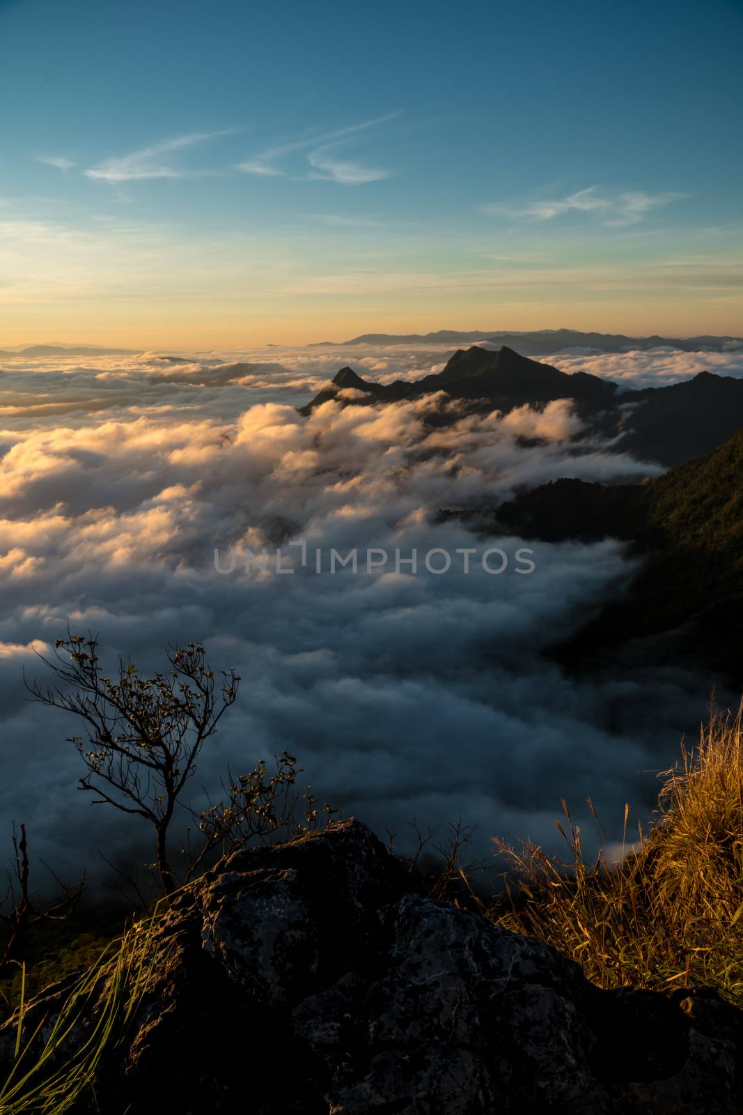 sunrise and sea of fog view on phu chi fa mountain by somesense