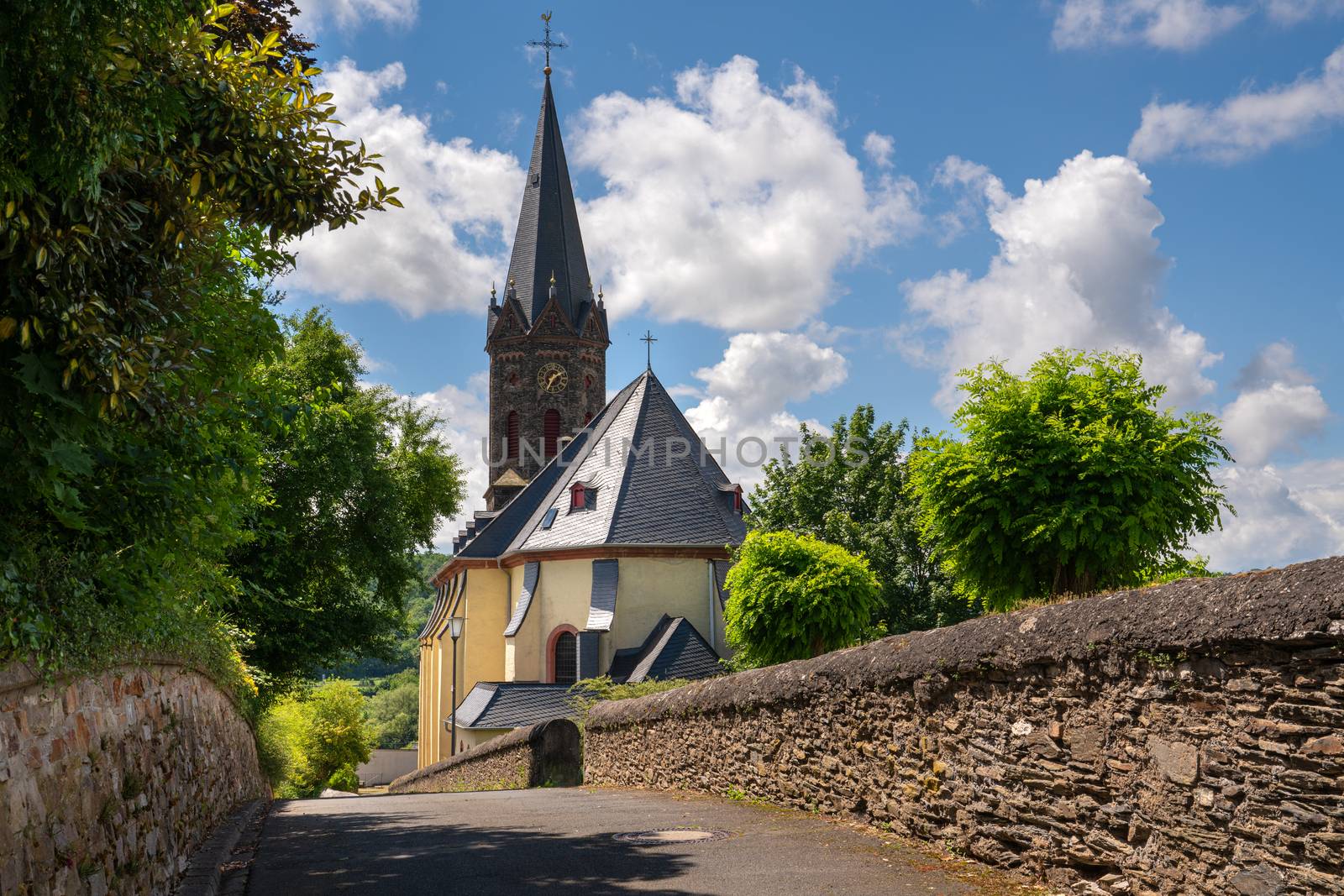 Panoramic image of the old Parish Church of Lieser close to Bernkastel on a sunny day, Moselle, Germany