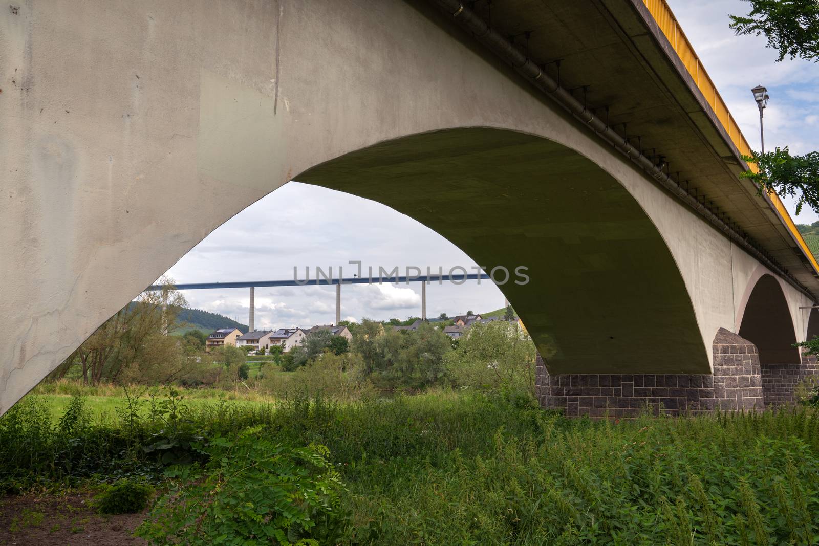 Bridges crossing the Moselle river close to Zeltingen, Germany 