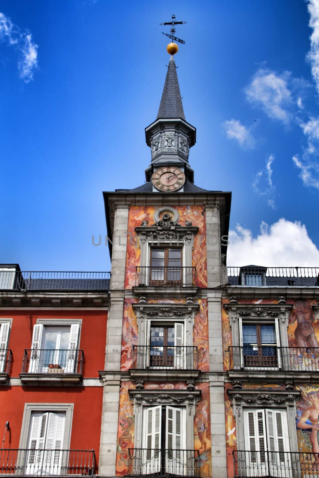 Beautiful main square in Madrid called Plaza Mayor with its majestic facades in a sunny day of Spring