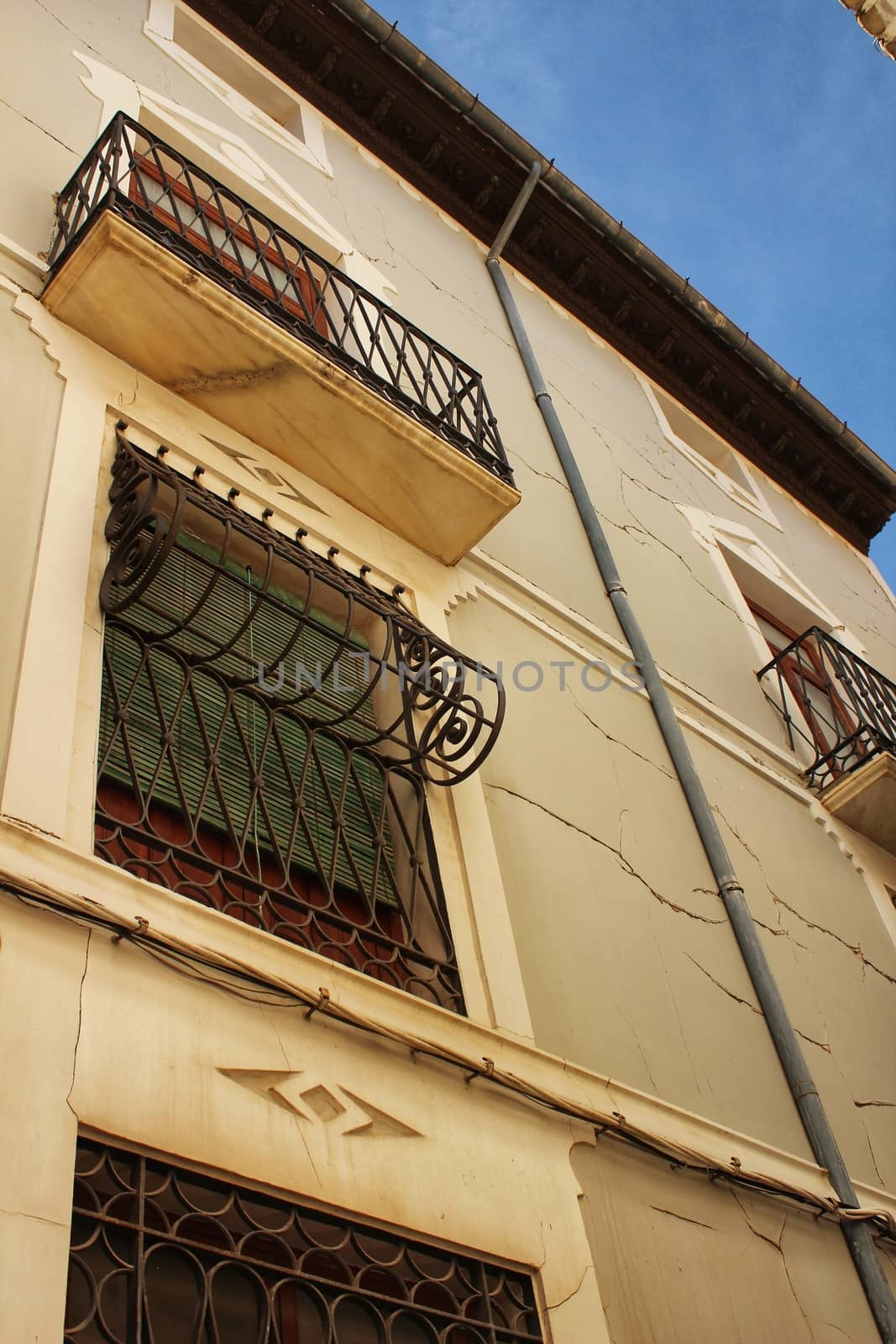 Old stone facades in Caravaca de La Cruz village by soniabonet