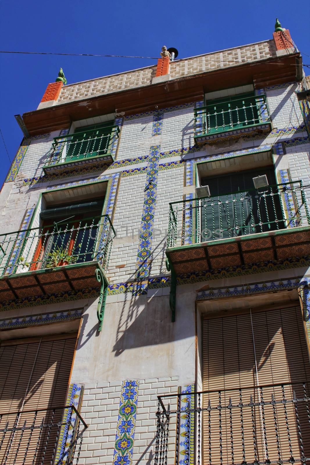 Colorful and majestic old house facade in Caravaca de la Cruz, Murcia, Spain by soniabonet