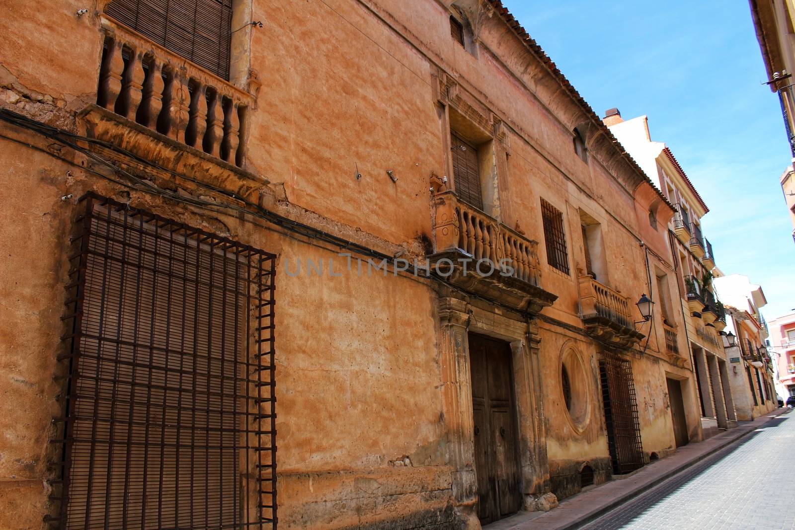 Colorful and majestic old house facade in Caravaca de La Cruz, Murcia, Spain in a sunny day of Spring