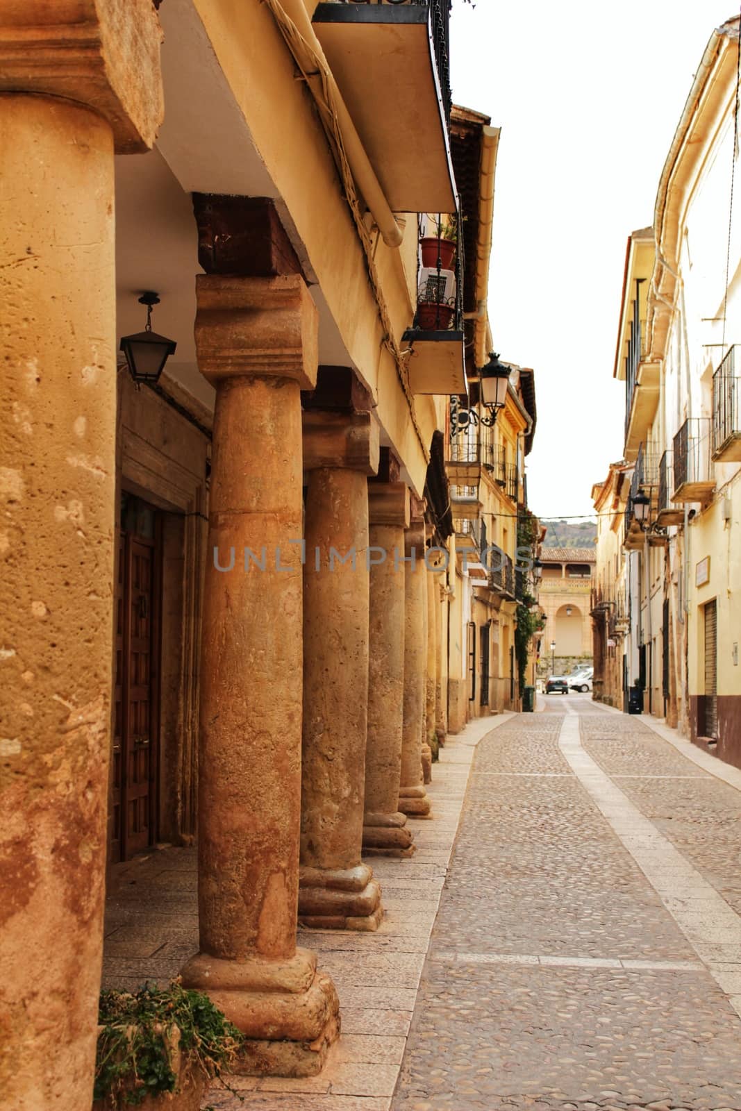 Majestic and old stone houses through the streets of Alcaraz, Castile-la Mancha community, Spain by soniabonet