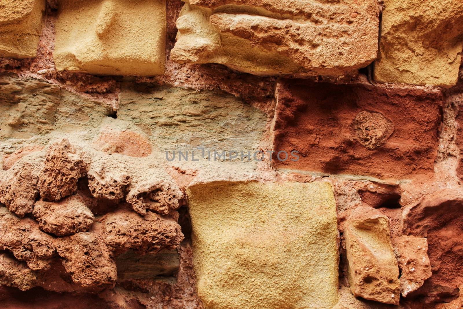 Colorful stone textures in a wall