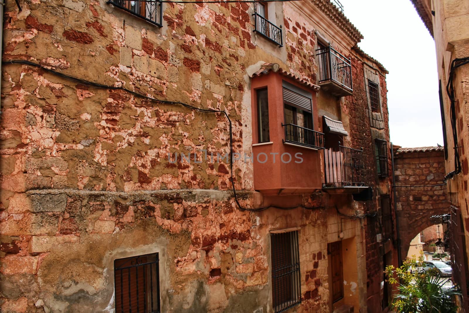Narrow streets with Renaissance style houses in Alcaraz, Spain by soniabonet
