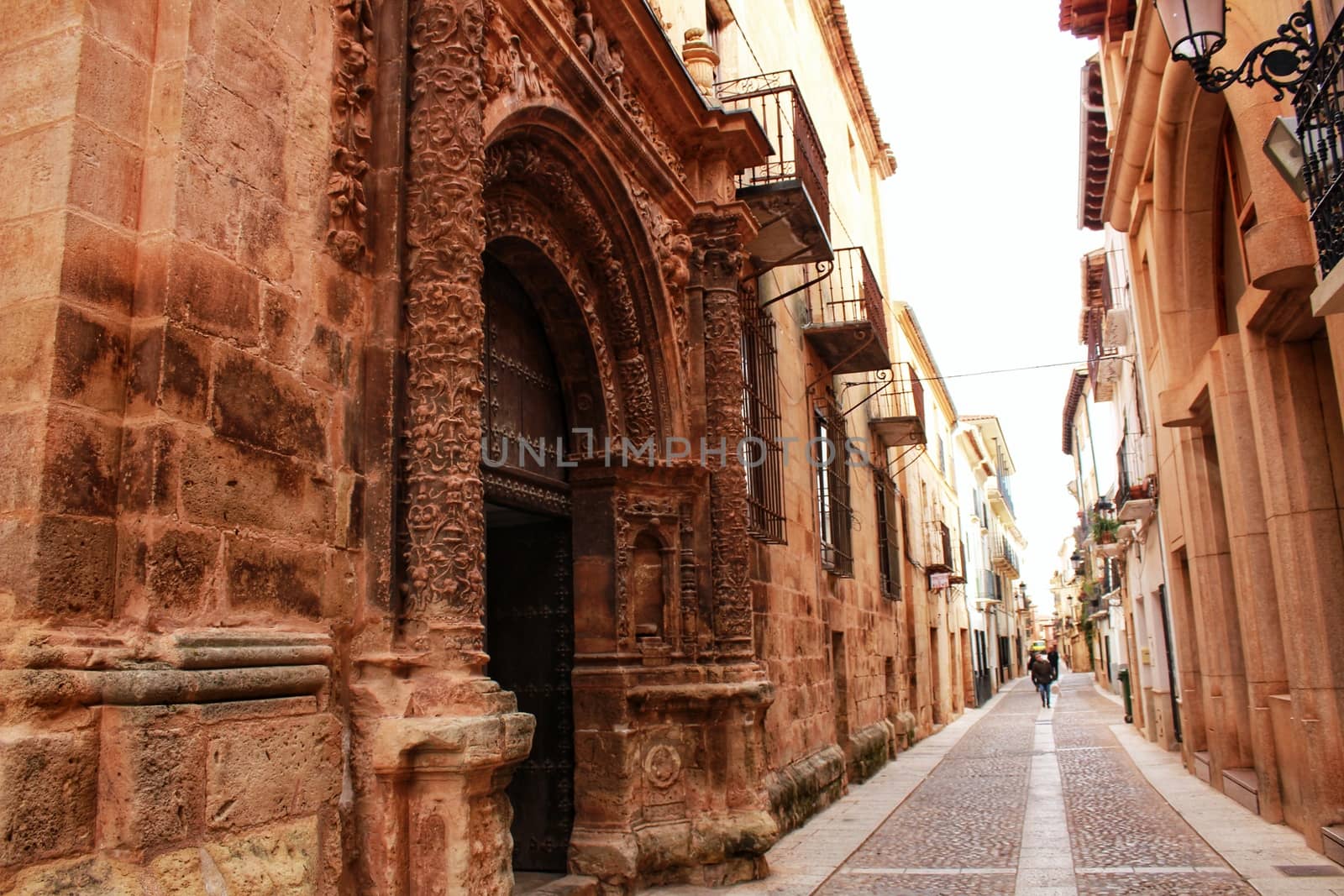 Narrow streets with Renaissance style houses in Alcaraz, Spain by soniabonet