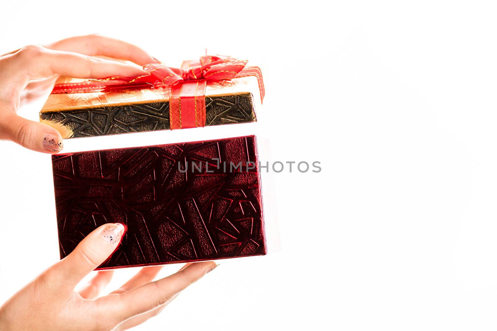 Hand receiving and opening a gift present box isolated on white background.