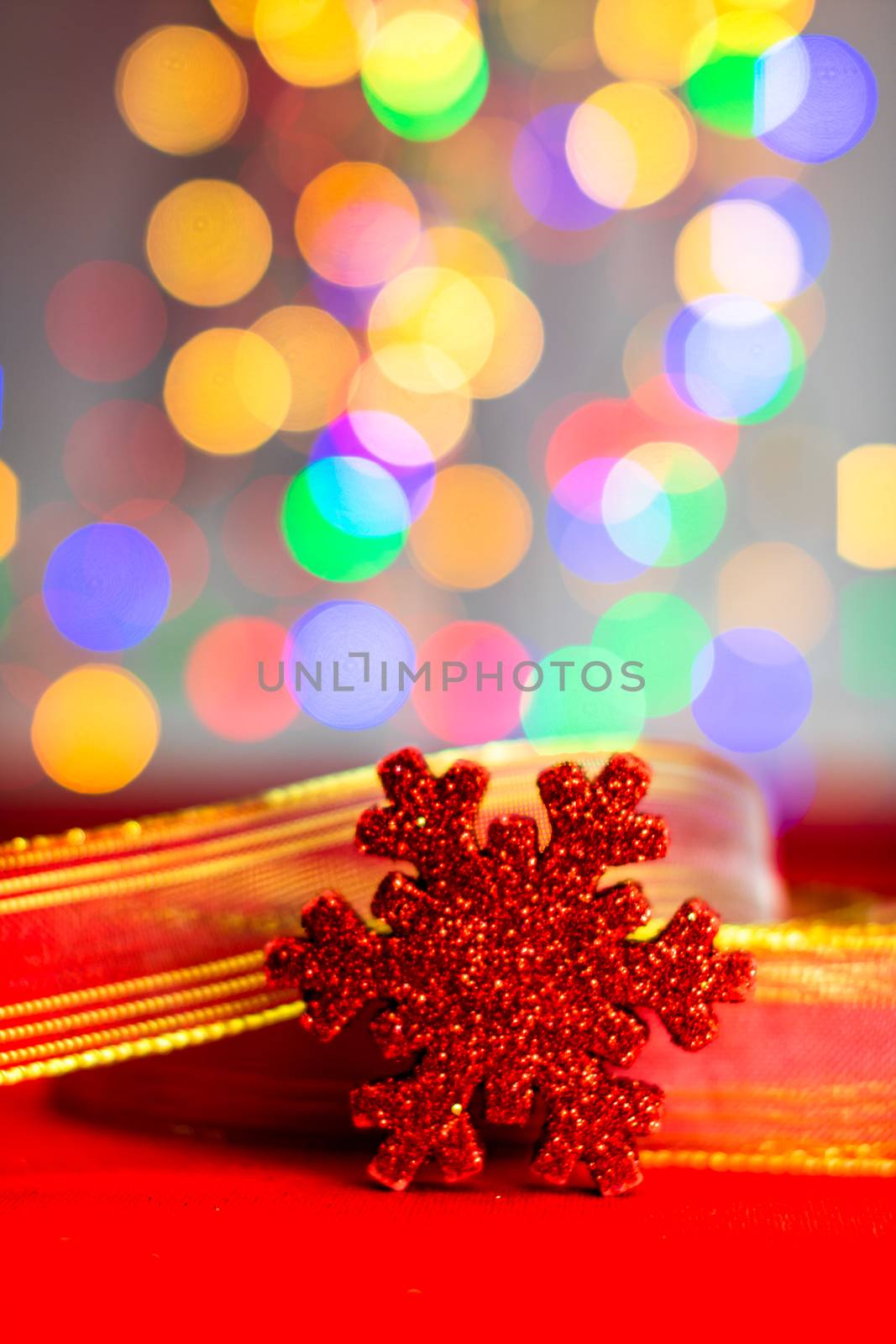 Red glittery decoration in a colorful Christmas composition isol by vladispas