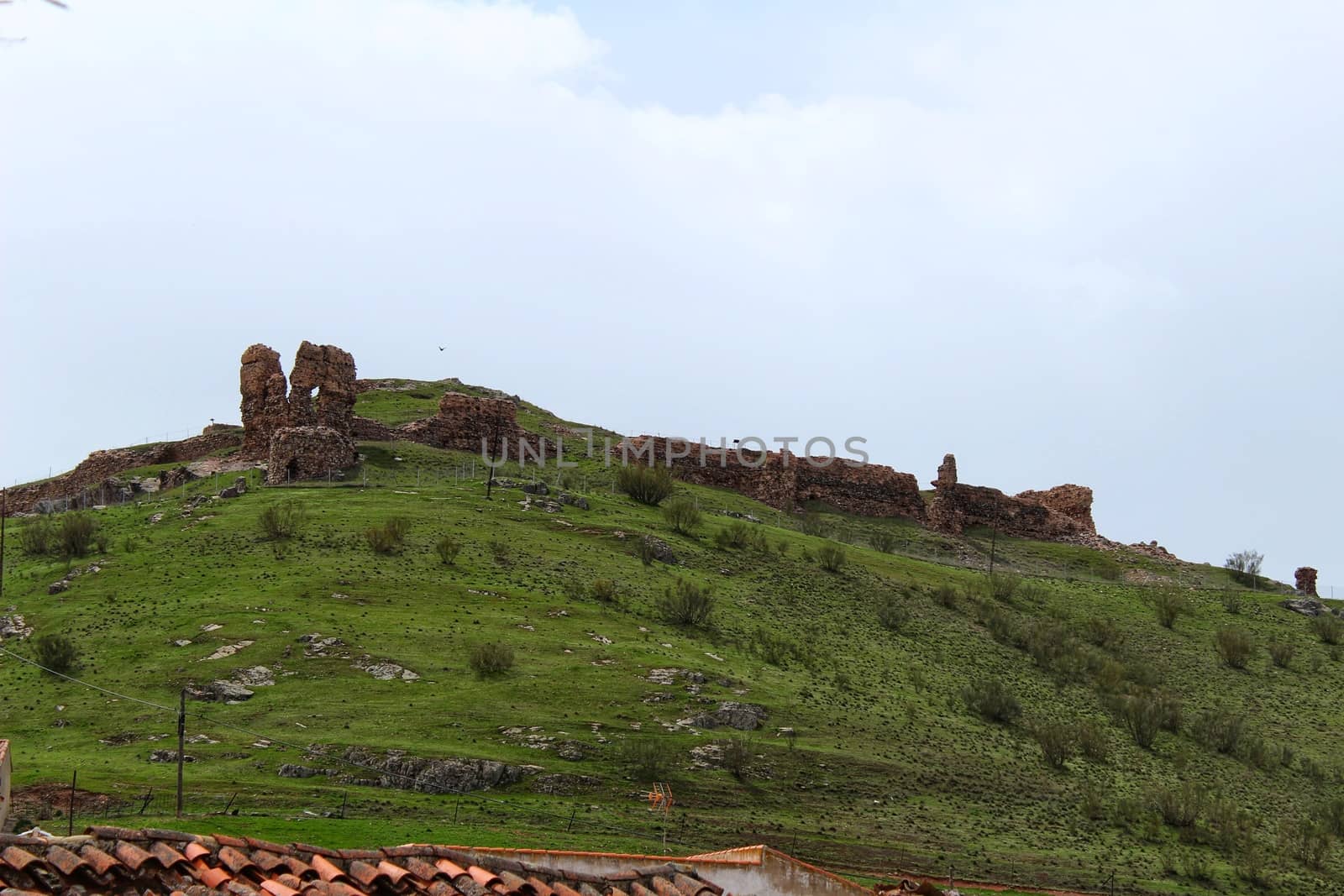 Old castle ruins in the mountain of Alcaraz in a cloudy day of spring. Alcaraz, Albacete, Spain.