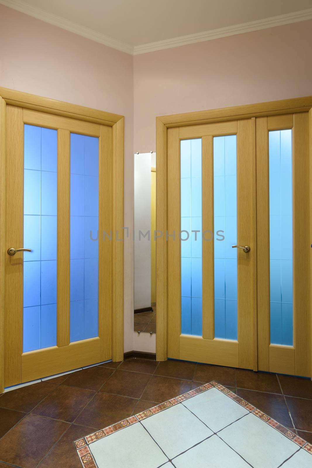 Closed glass interior doors, view from the corridor