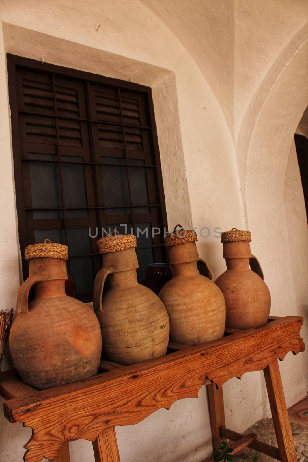 Clay pots for water in a typical courtyard of a Spanish house in Castile-la Mancha