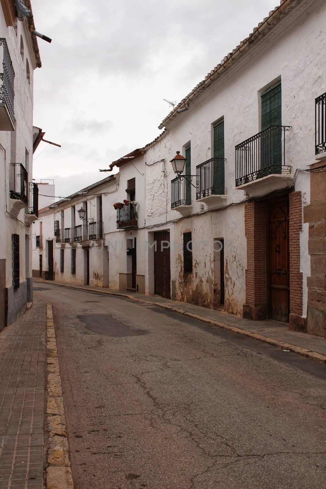 Old and majestic houses in the streets of Villanueva de los Infa by soniabonet