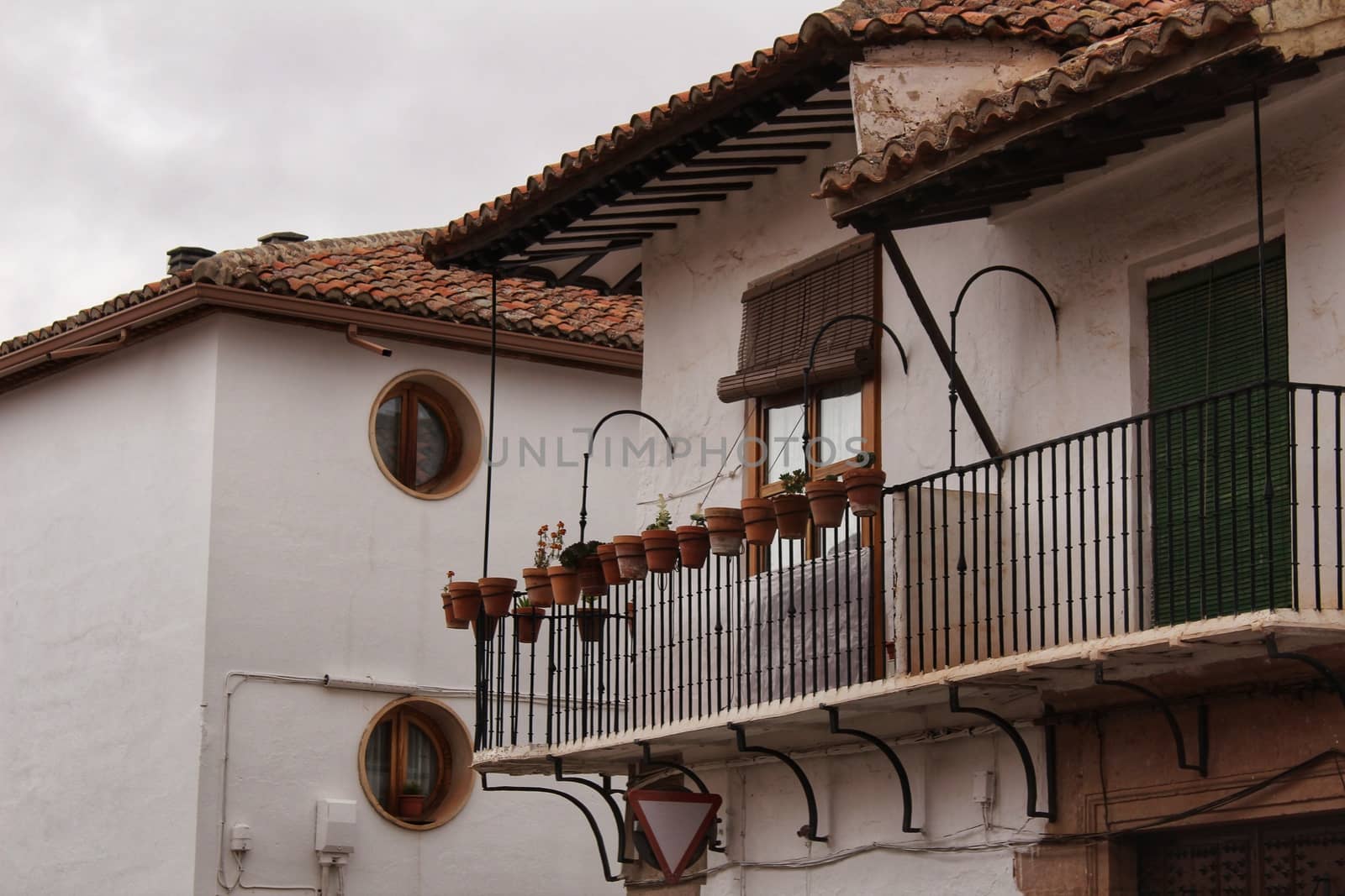 Old and majestic houses in the streets of Villanueva de los Infa by soniabonet