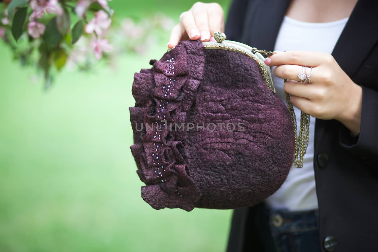 purple Elegant Felting wool fashion handmade handbag in hand. street fashion look