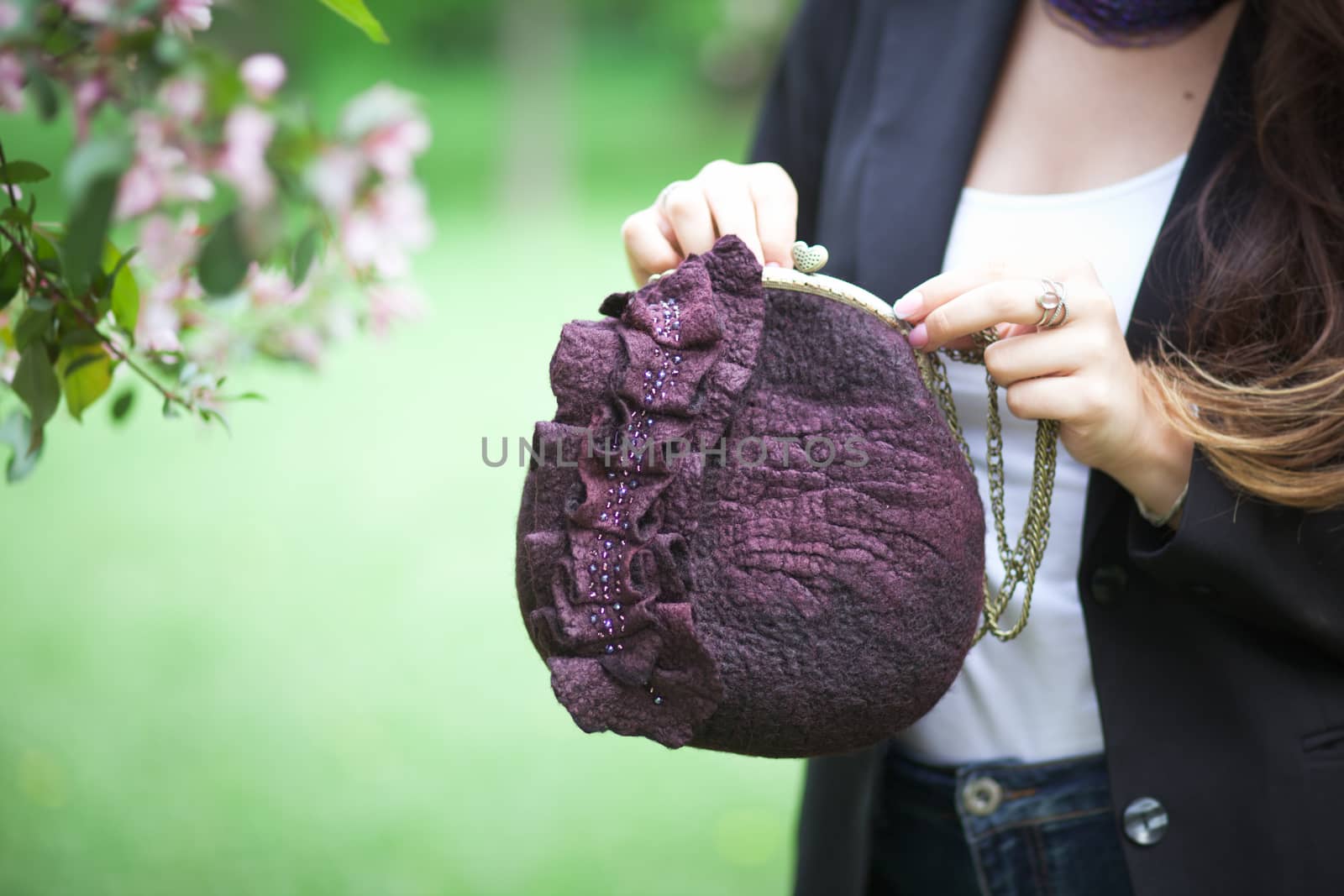 purple Elegant Felting wool fashion handmade handbag in hand. street fashion look