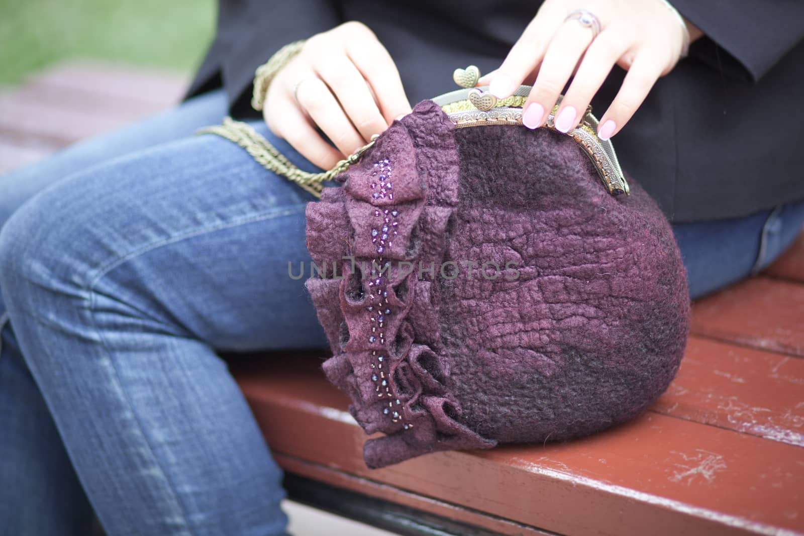 purple Elegant Felting wool fashion handmade handbag in hand. street fashion look