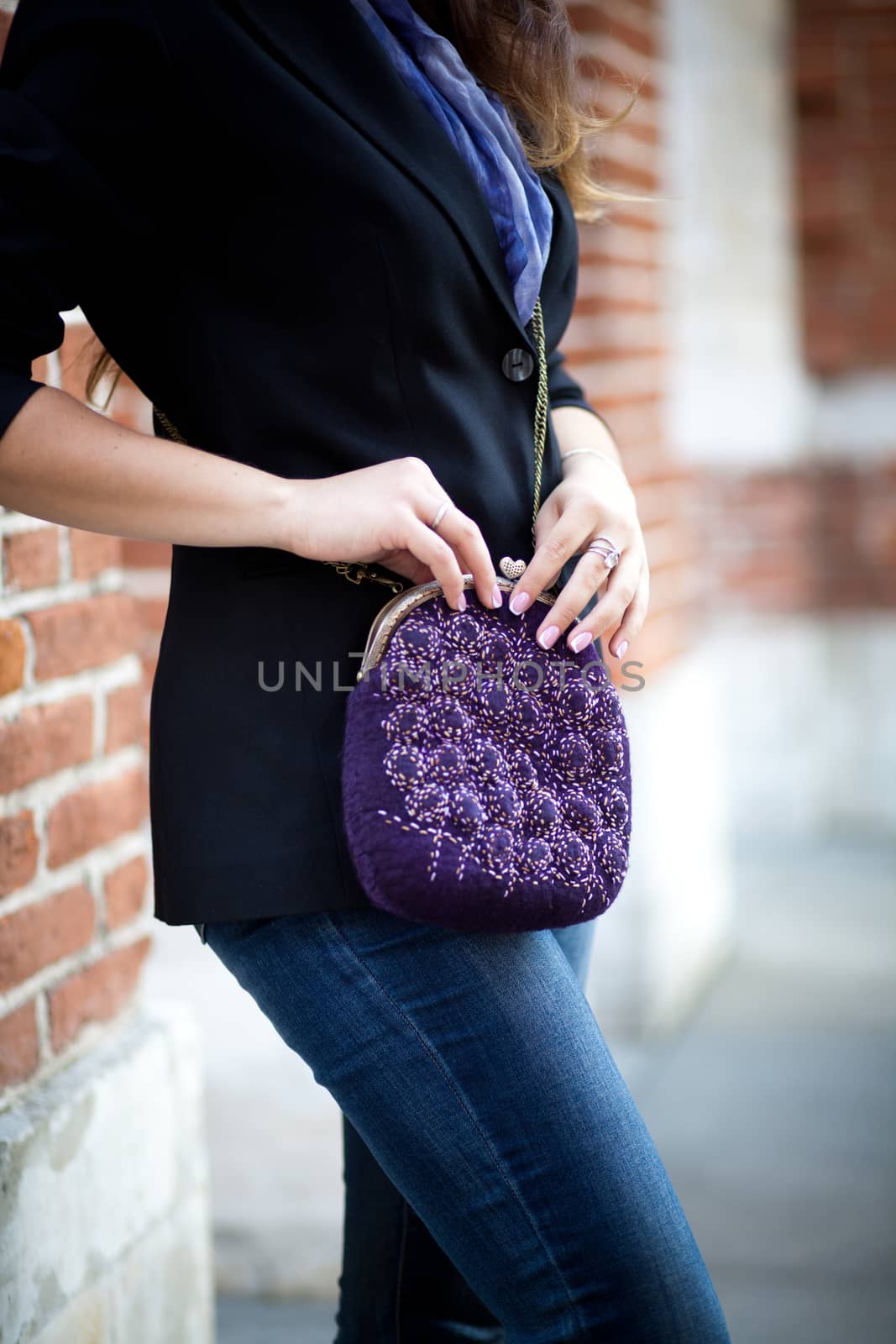 purple Elegant Felting wool fashion handmade handbag in hand. street fashion look