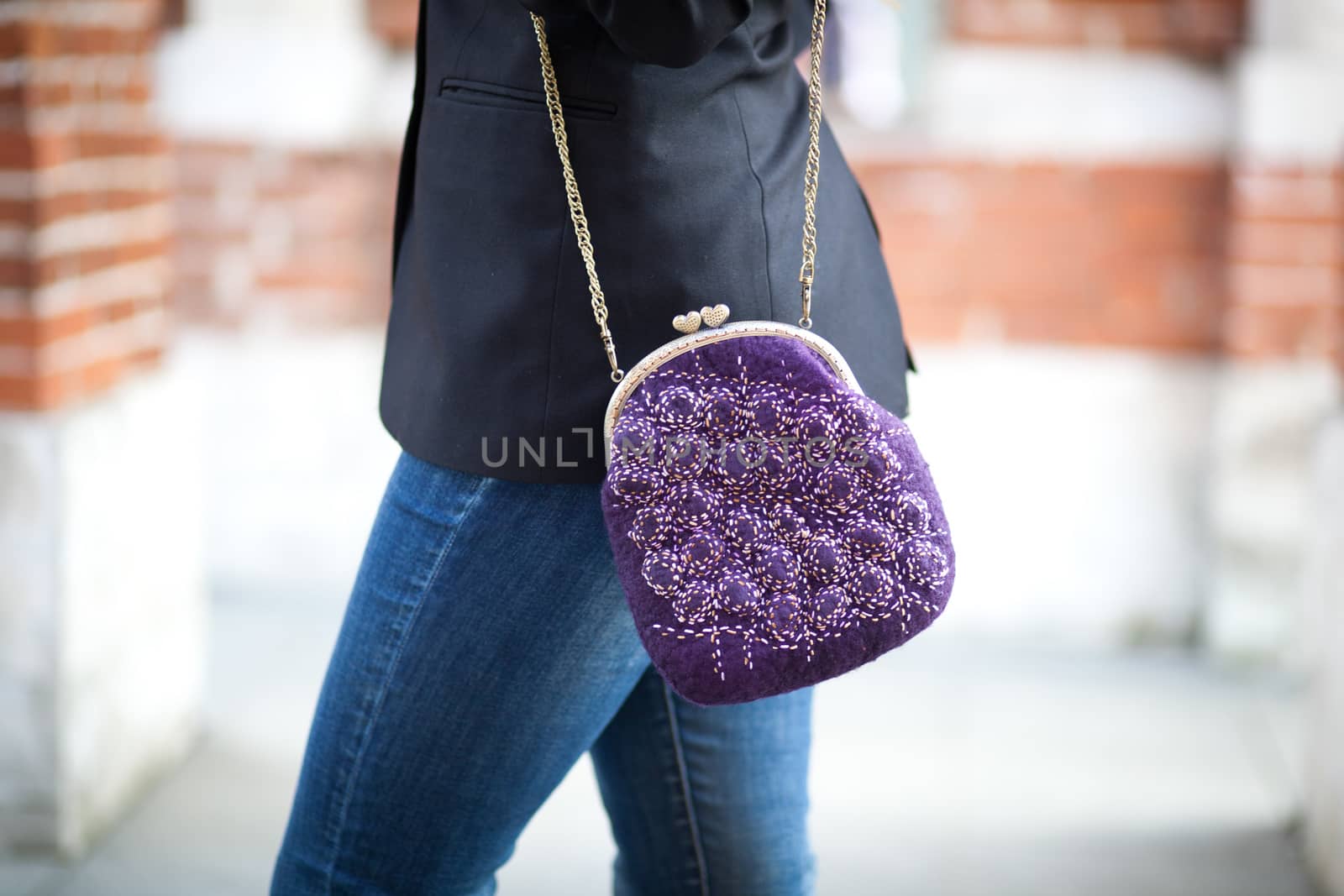 purple Elegant Felting wool fashion handmade handbag in hand. street fashion look