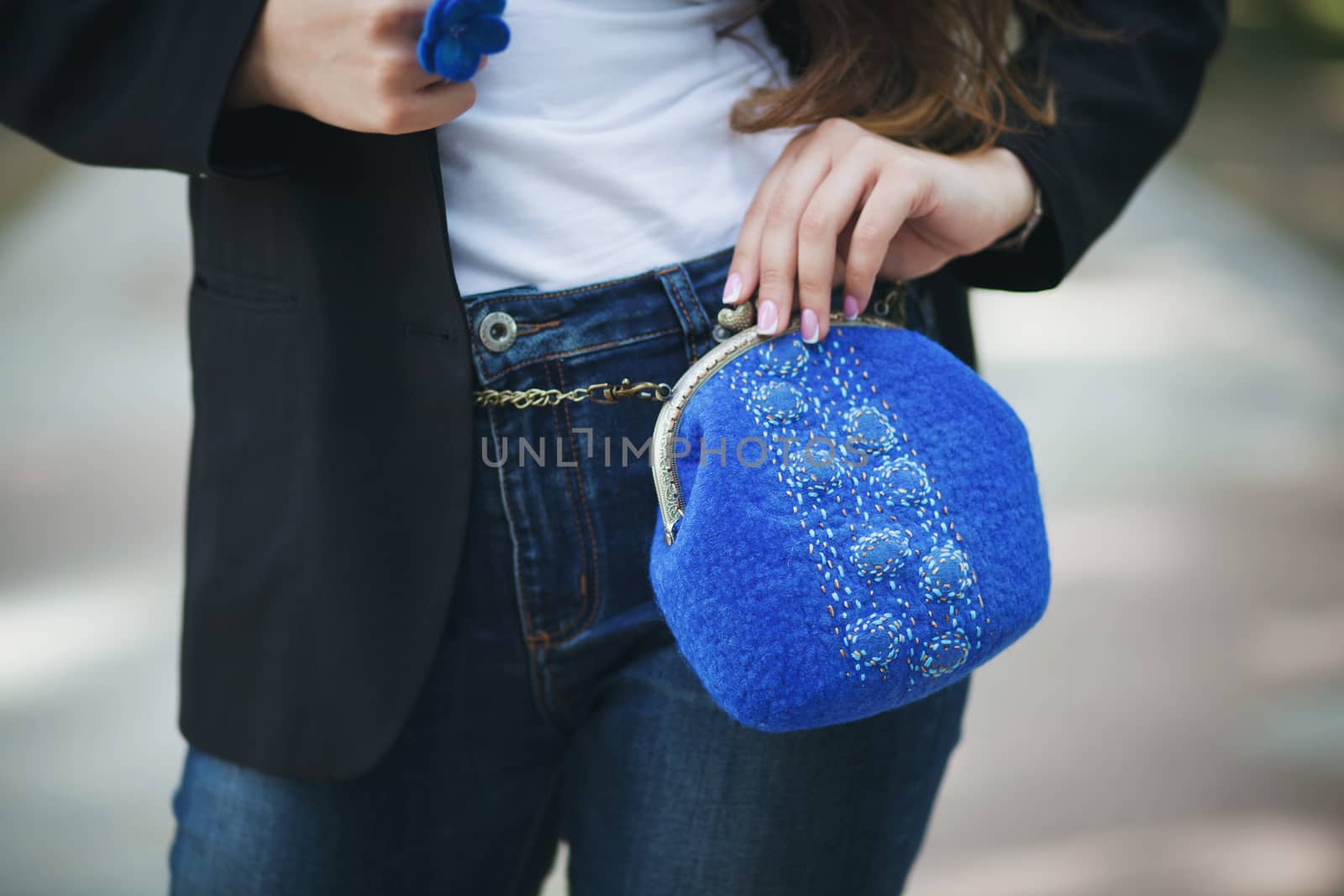 blue Elegant Felting wool fashion handmade handbag in hand. street fashion look