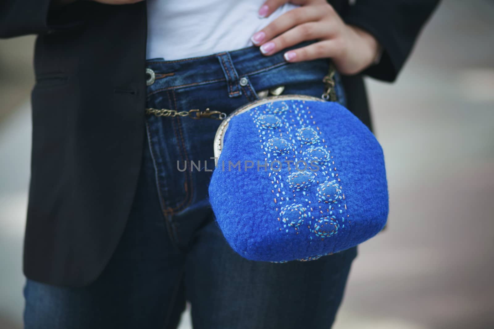 blue Elegant Felting wool fashion handmade handbag in hand. street fashion look