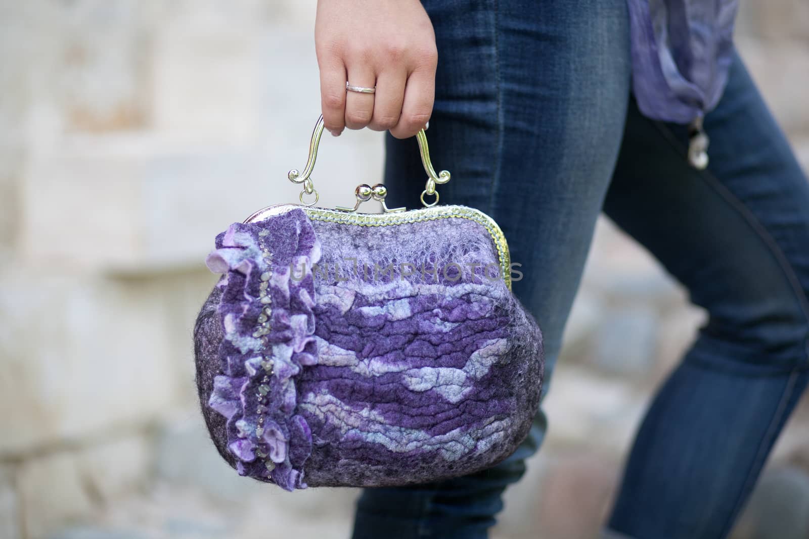 purple Elegant Felting wool fashion handmade handbag in hand. street fashion look