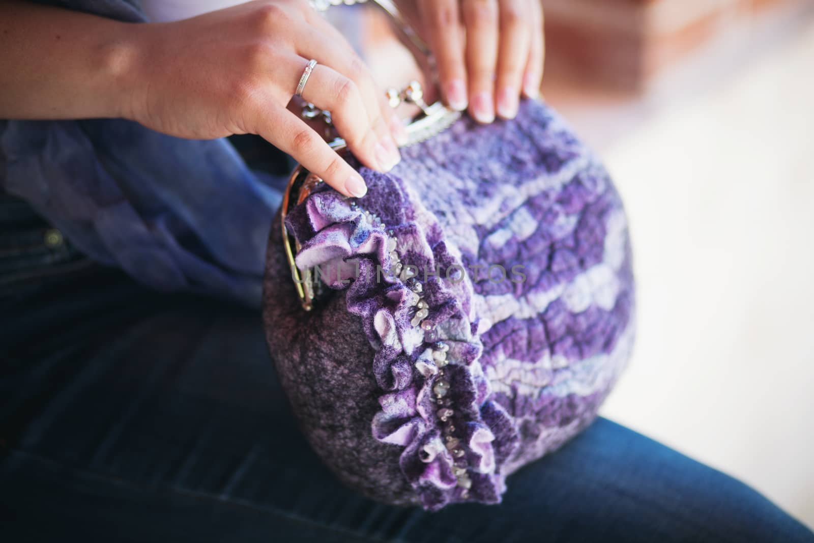 purple Elegant Felting wool fashion handmade handbag in hand. street fashion look