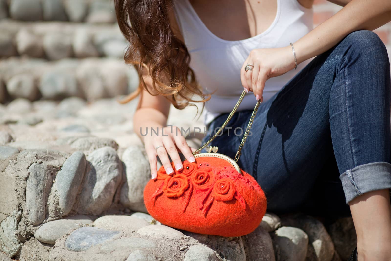 red Elegant Felting wool fashion handmade handbag in hand. street fashion look