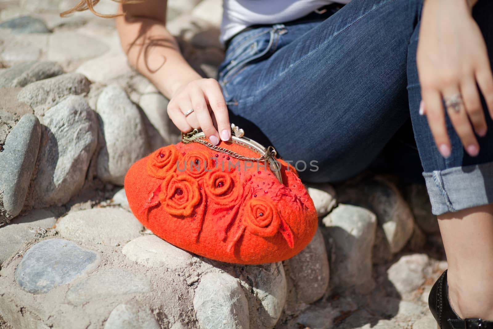 red Elegant Felting wool fashion handmade handbag in hand. street fashion look