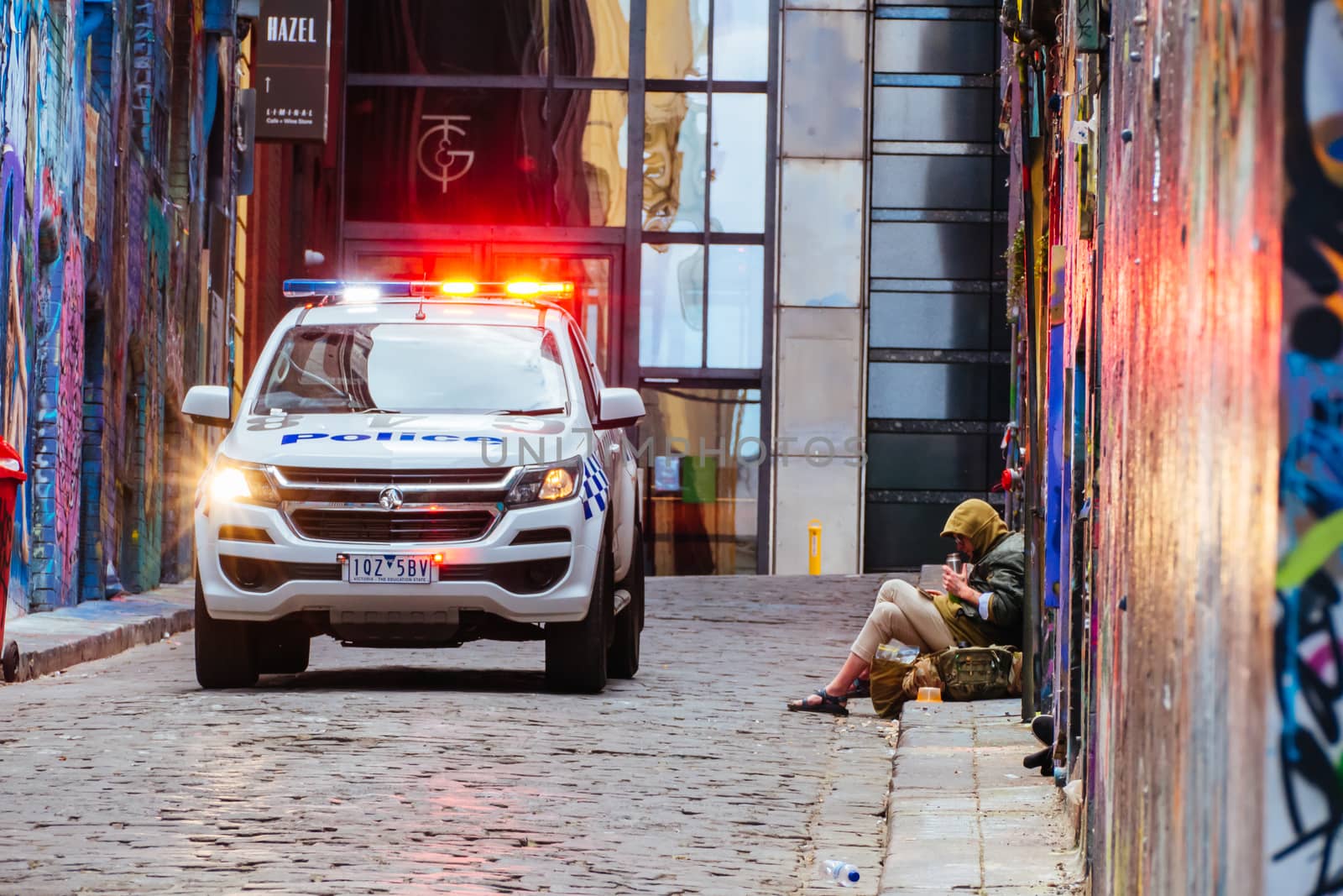 Melbourne, Australia - October 10th 2020: Police do routine checks against pandemic rules in Hosier Lane during the Coronavirus pandemic and associated lockdown.