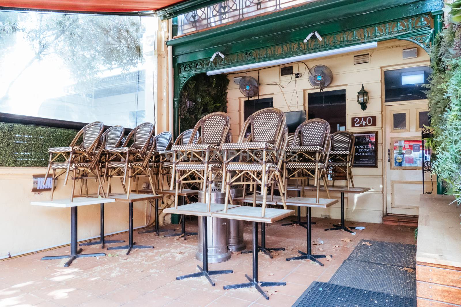 Melbourne, Australia - October 10th 2020: Lygon St restaurants are closed and packed up empty during the Coronavirus pandemic and associated lockdown.