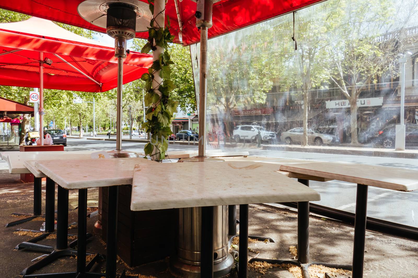 Melbourne, Australia - October 10th 2020: Lygon St restaurants are closed and packed up empty during the Coronavirus pandemic and associated lockdown.