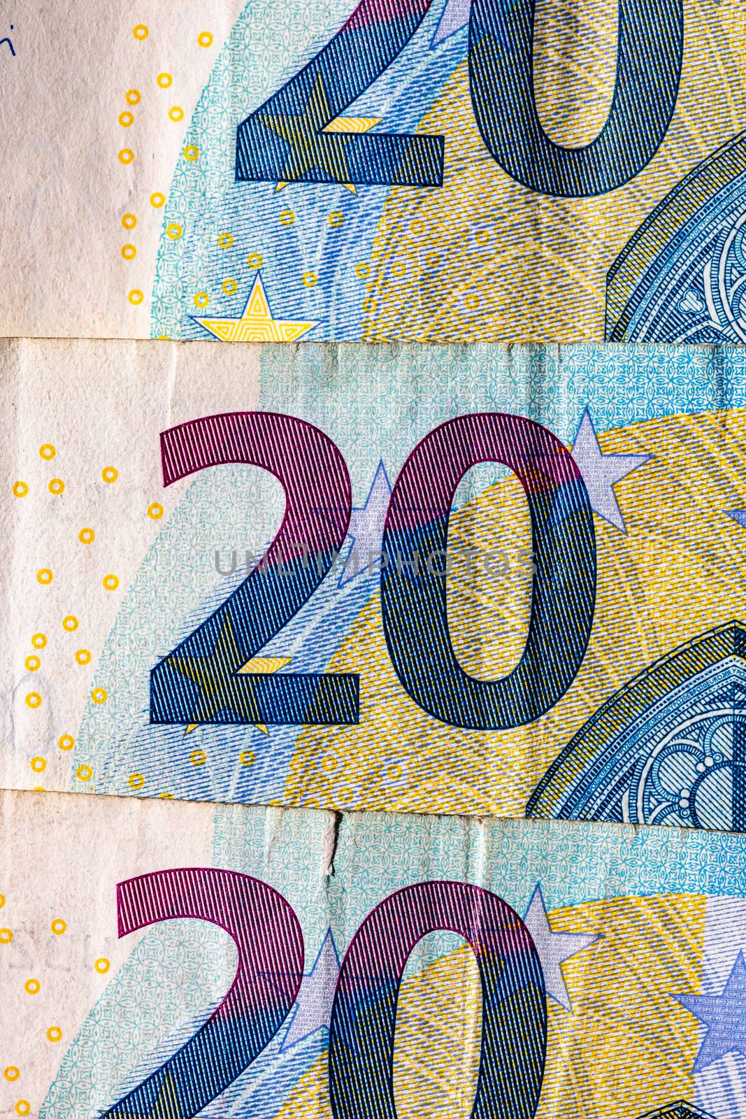 Selective focus on detail of euro banknotes. Close up macro deta by vladispas