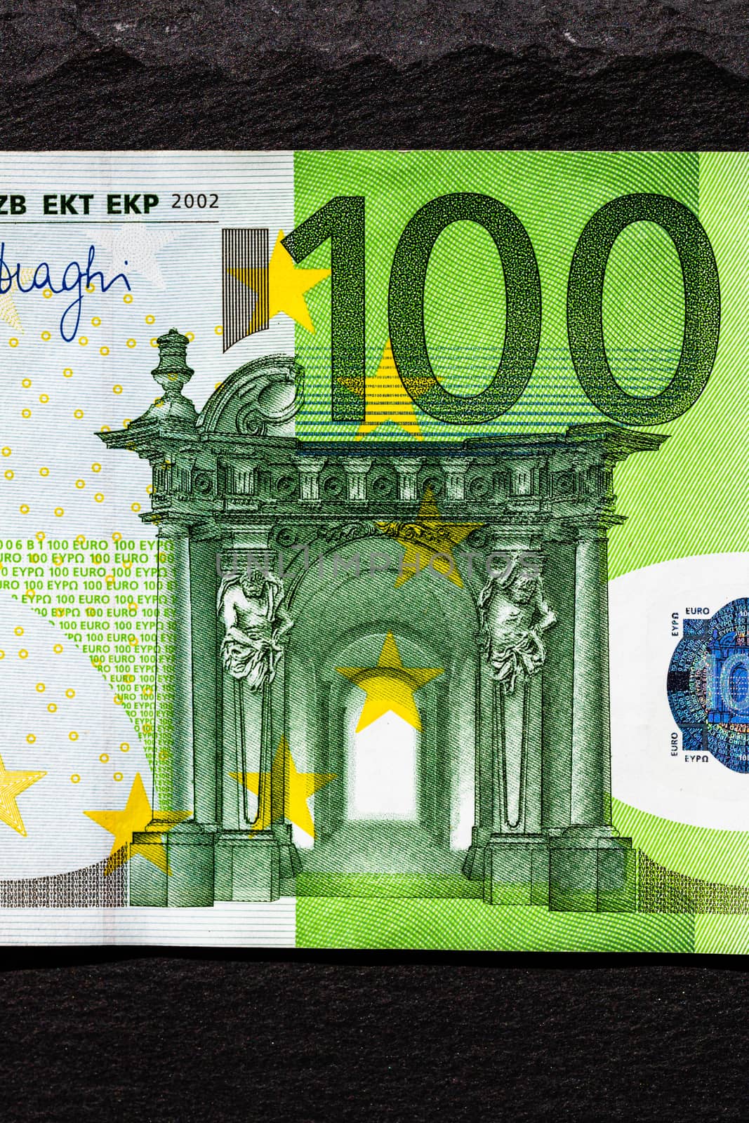 Selective focus on detail of euro banknotes. Close up macro deta by vladispas