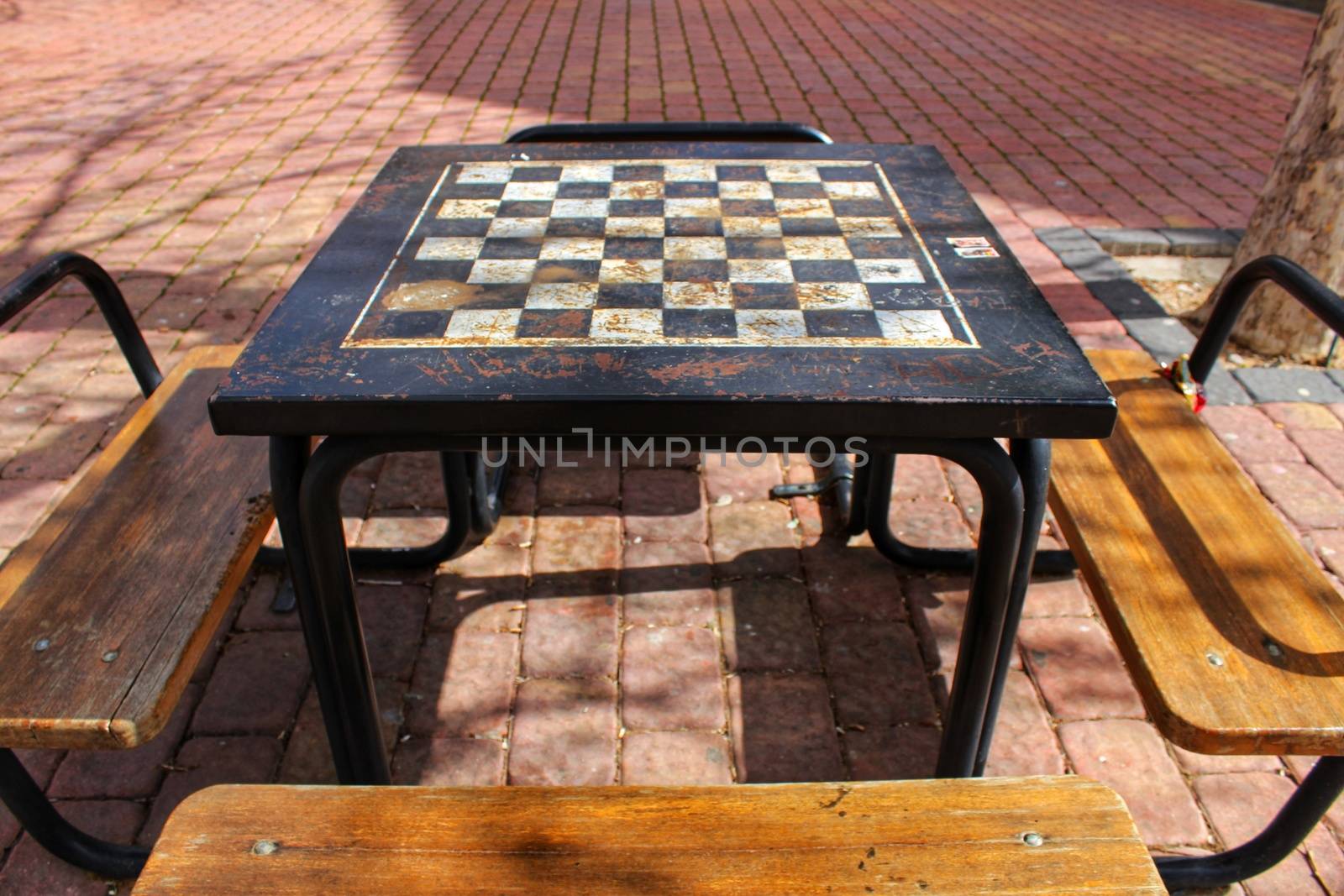 Board games on the street on wooden table by soniabonet