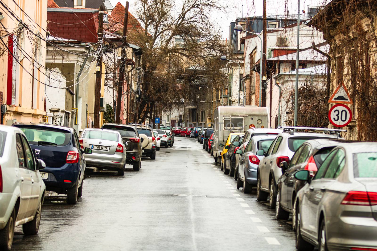 Car traffic at rush hour in downtown area of the city. Car pollution, traffic jam in the morning and evening in the capital city of Bucharest, Romania, 2020