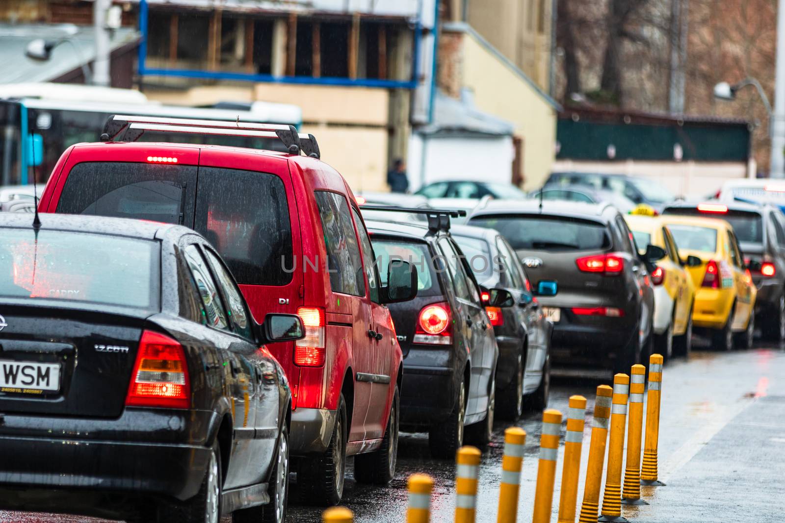 Car traffic at rush hour in downtown area of the city. Car pollution, traffic jam in the morning and evening in the capital city of Bucharest, Romania, 2020