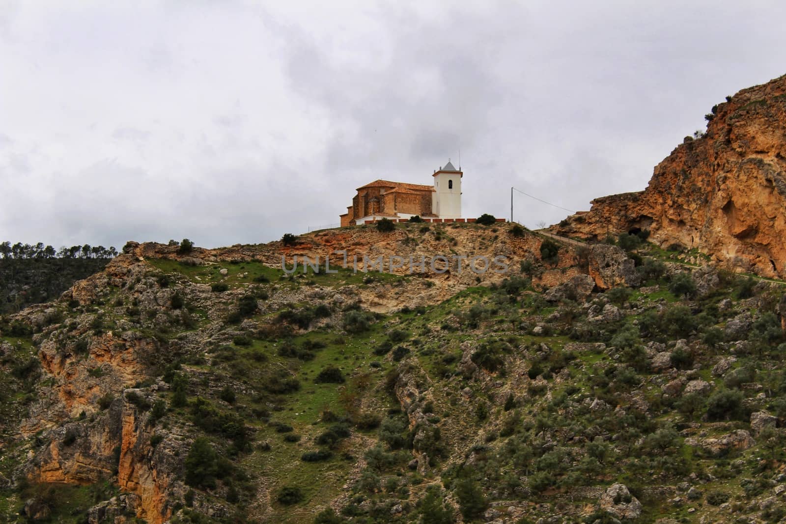 Views of the town of Villa de Ves between mountains and on top of the Sanctuary. Community of Castilla La Mancha, Albacete, Spain.