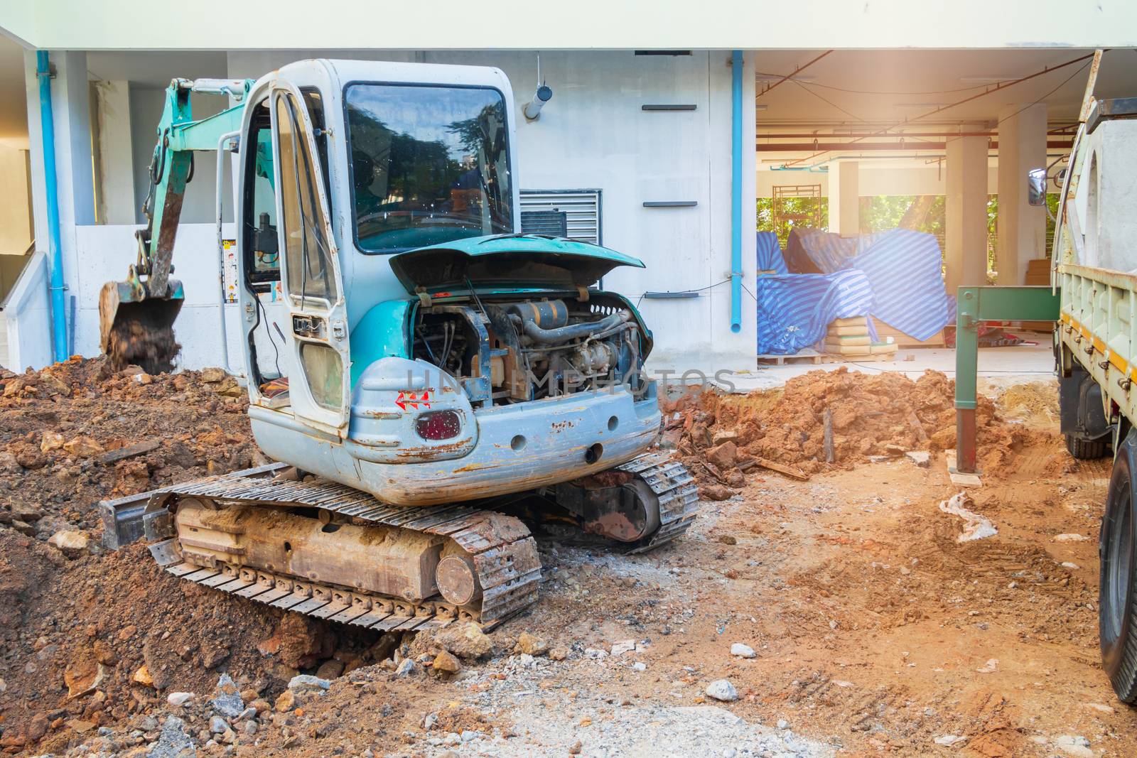 small excavator working excavation site construction  by pramot