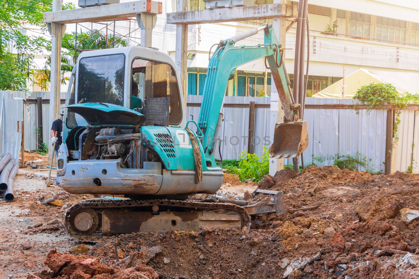 small excavator working excavation site construction  by pramot