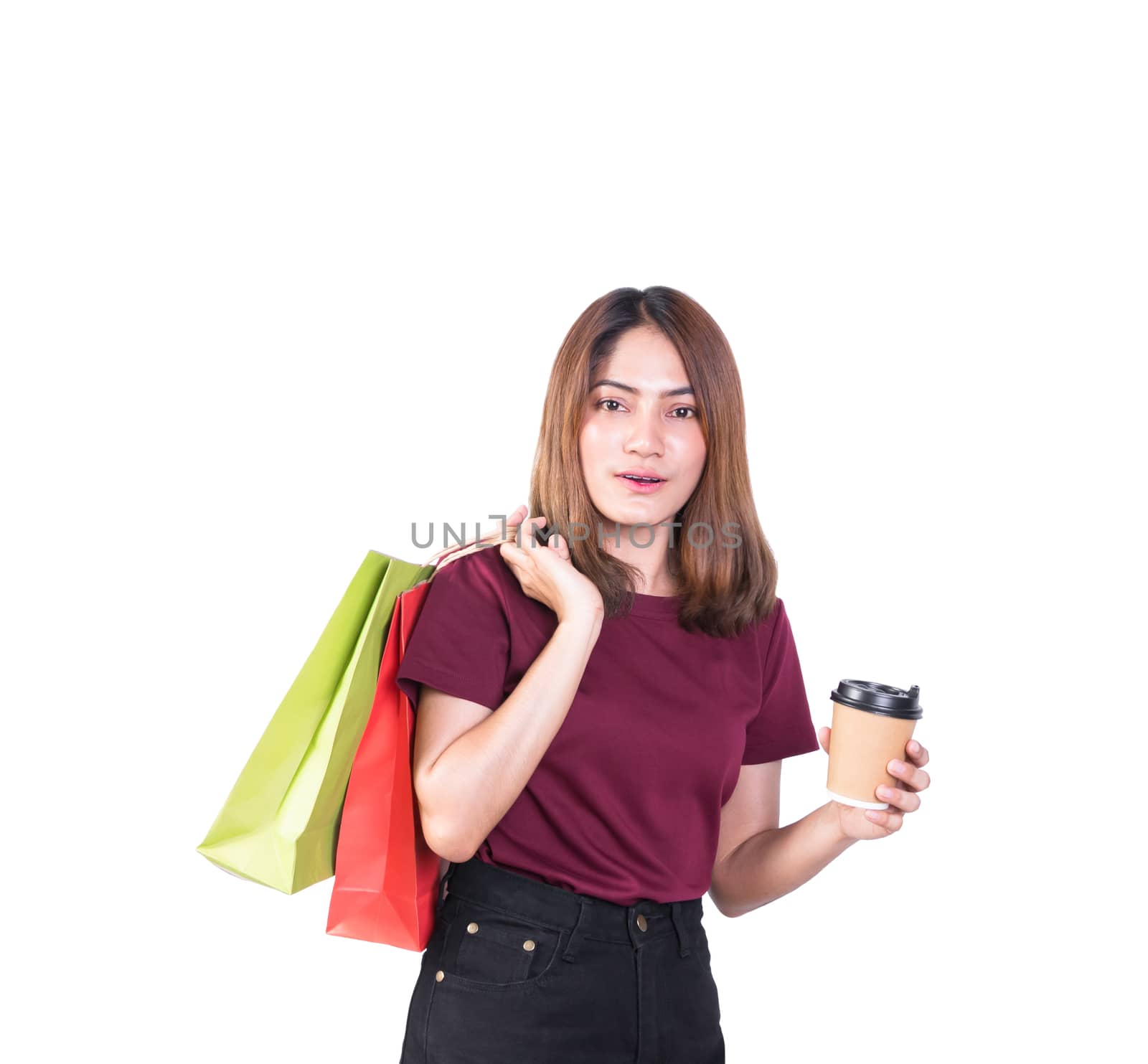 woman pretty smiling holding paper bags and Coffee carton cup in shopping. on white background and look at camera