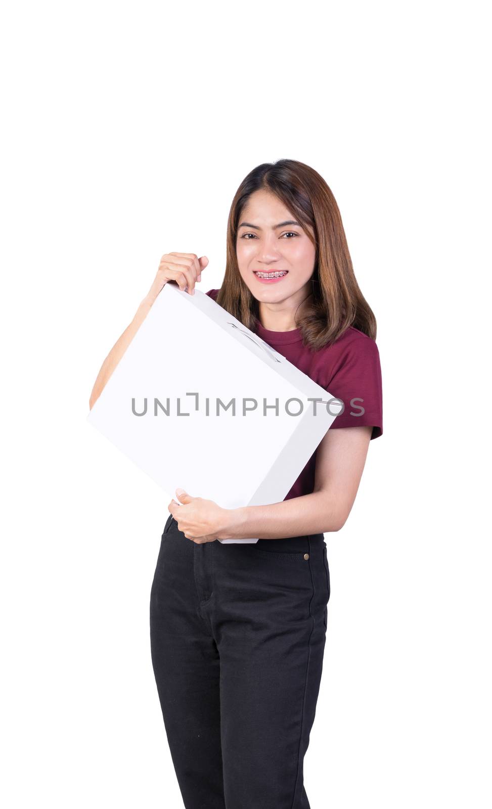 woman holding paper box. closeup on white background by pramot