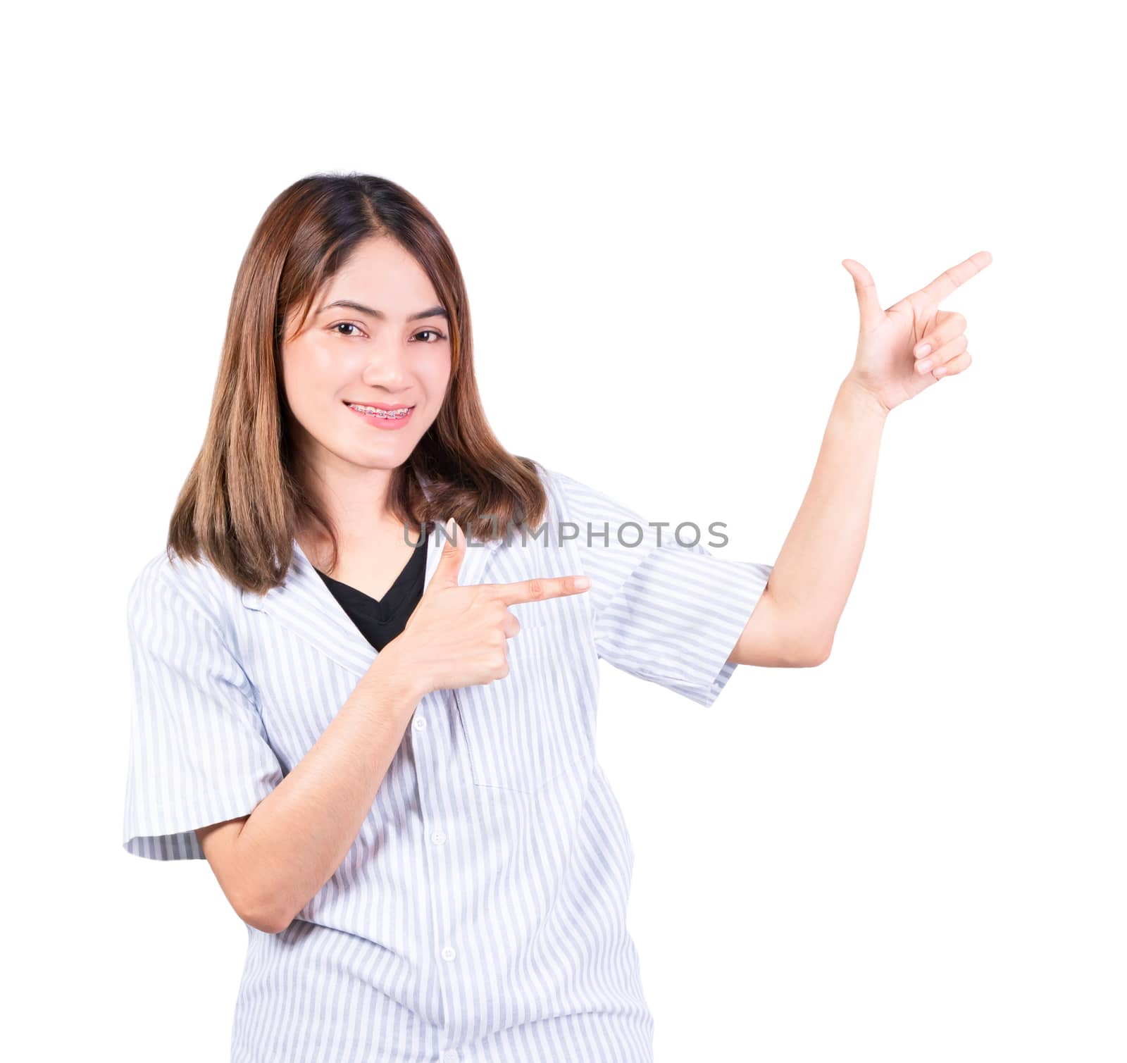 woman pointing finger up portrait on white background by pramot