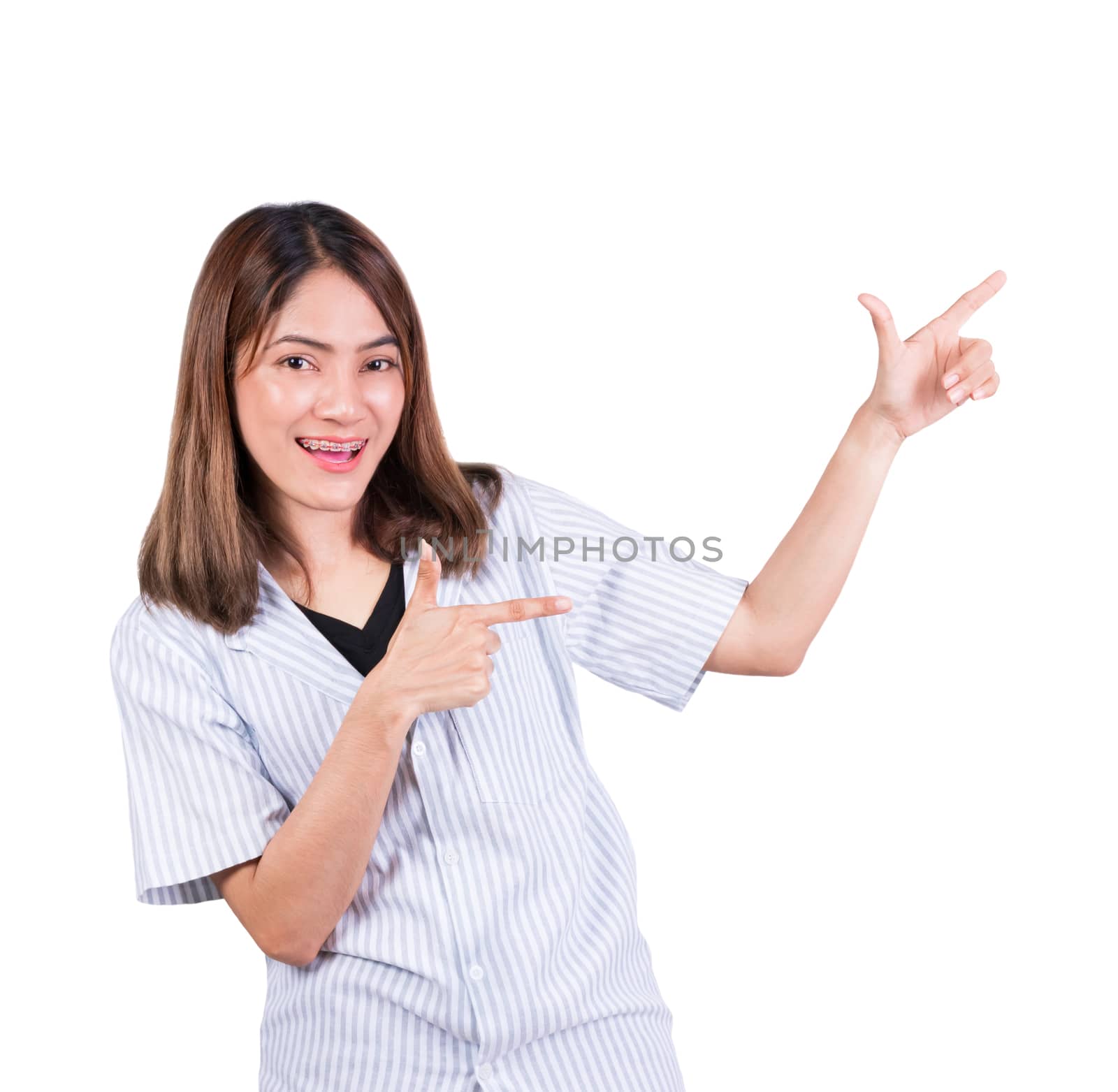 woman pointing finger up portrait on white background by pramot