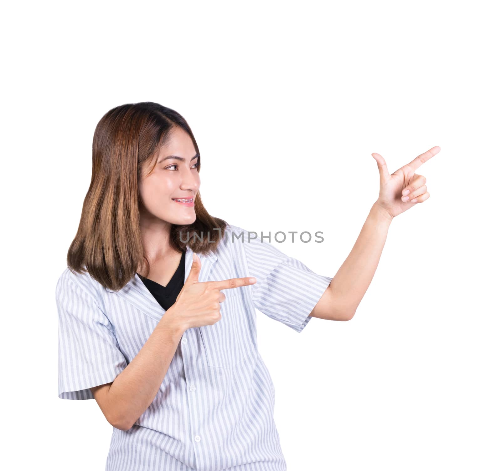 woman pointing finger up portrait on white background by pramot