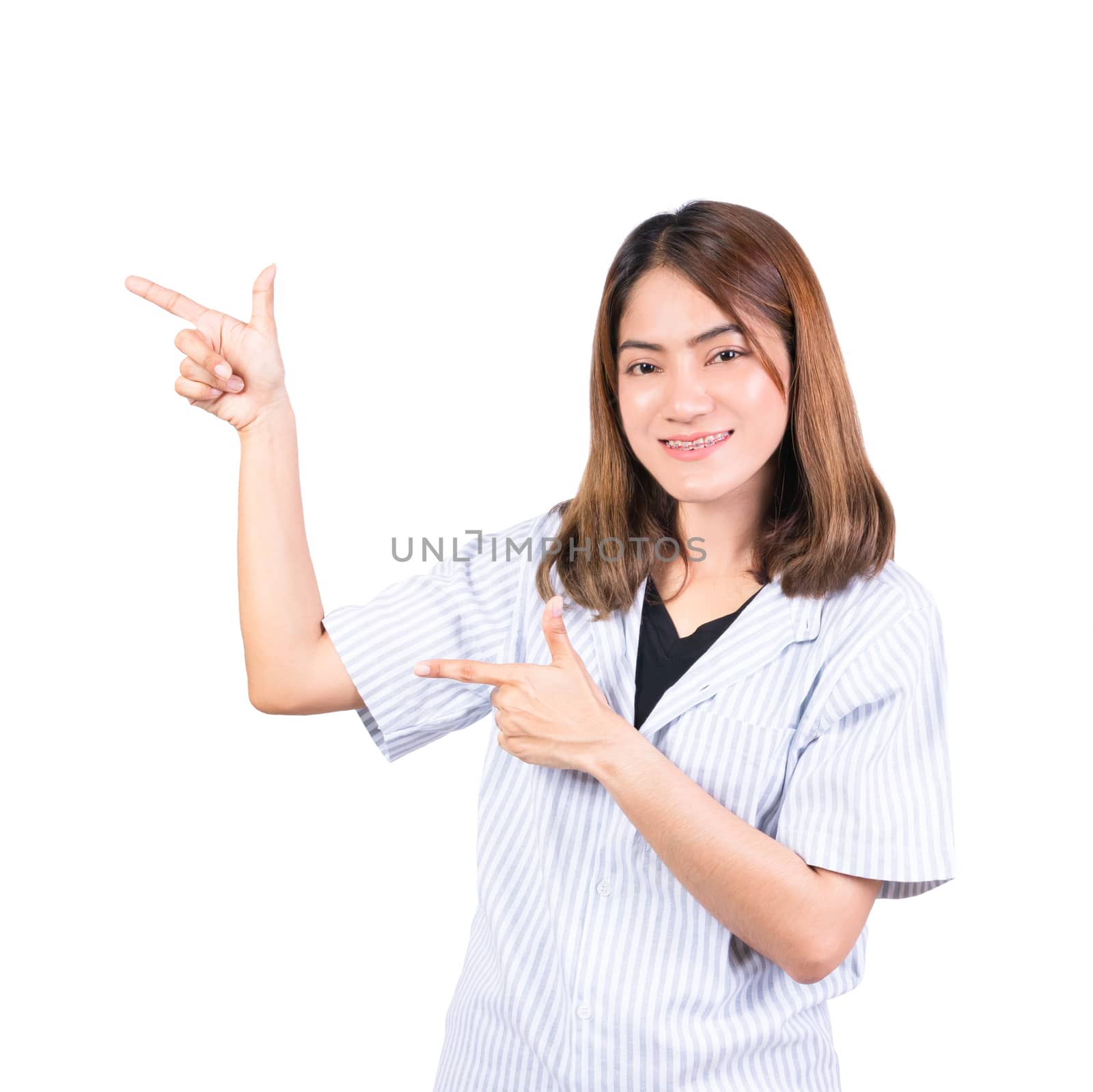 woman pointing finger up portrait on white background by pramot